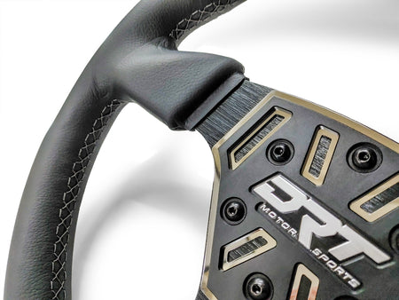 Details of a Round utv steering wheel in leather finish
