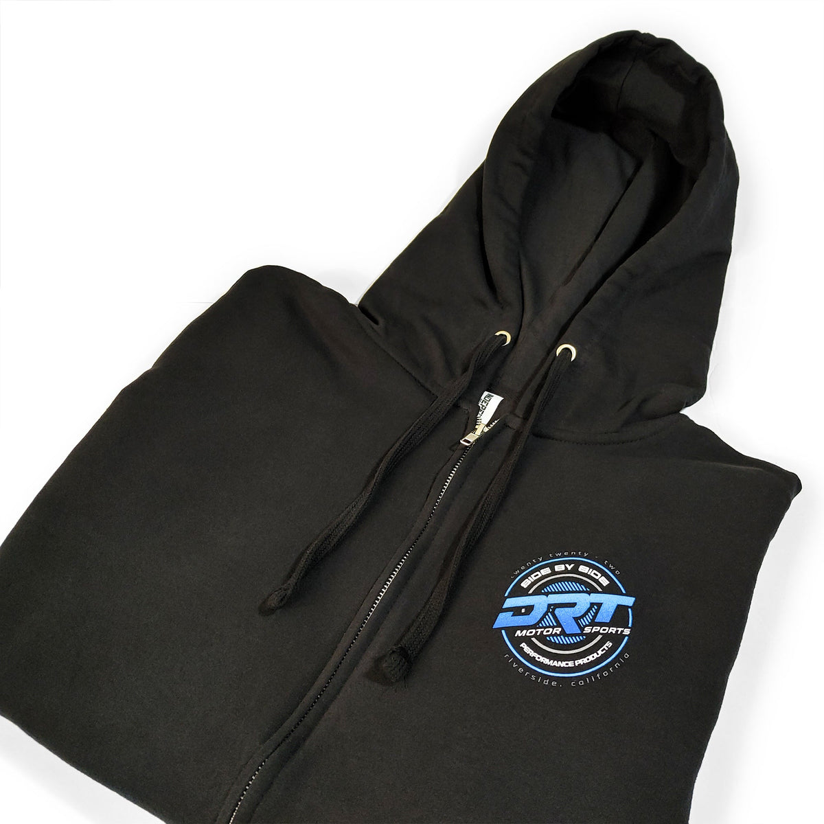 Folded hoodie with garment tag visible.